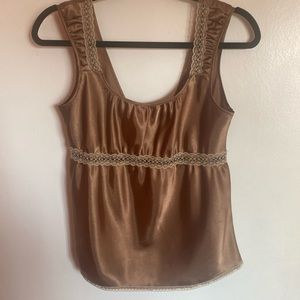 Tank top with lace cutouts and trim. Very thin material